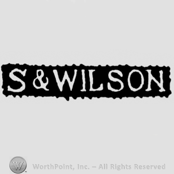 The name S & Wilson written with uppercase letters