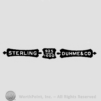 The worlds Sterling Duhme & Co. written with uppercase letters, a shield with numbers 925 over 100 in the center. 