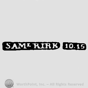 The name Sam. L. Kirk written with uppercase letters followed by number 10 and 15.