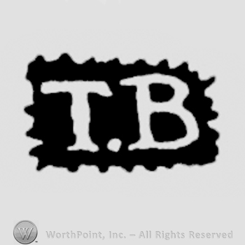 The letters TB written in uppercase