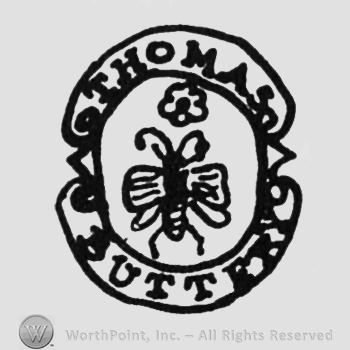 a bee, a flower above, label above "THOMAS", under "BUTTERY"