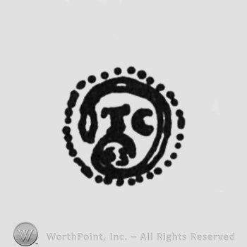 initials T C inside a circle, digits 63