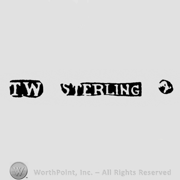 The letters T.W. written in uppercase or the name Sterling also written with uppercase letters; a bird's head in profile with a long peak