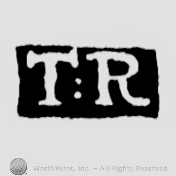 The letters T.R. written in uppercase
