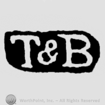 The letters T & B written in uppercase