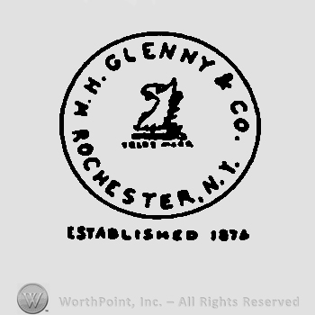 A circle with a horse head inside, W.H. Glenny & Co. Rochester N.Y. written around the horse's head with uppercase letters, Established 1874 written below with uppercase letters. 