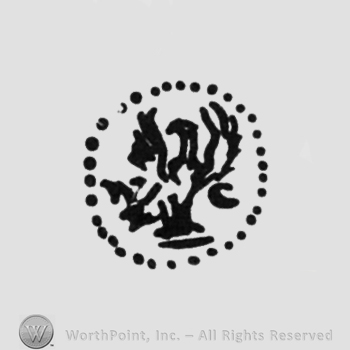 an eagle, initials W C on each side