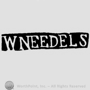 The name W. Needels written with uppercase letters