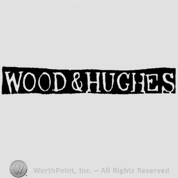 The name Wood & Hughes written with uppercase letters
