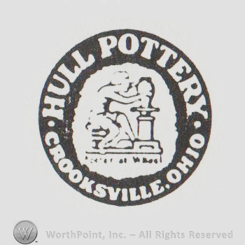 circle with a potter in the middle and HULL POTTERY CROOKSVILLE OHIO written on the edge