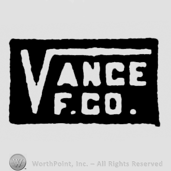 Vance written above F.CO. all written with white in a black frame