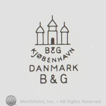 a castle with three towers above B & G KJOBENHAVN MADE IN DENMARK