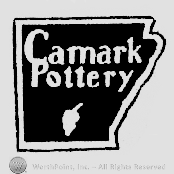 Camark written above Pttery written above a leaf, all in a frame