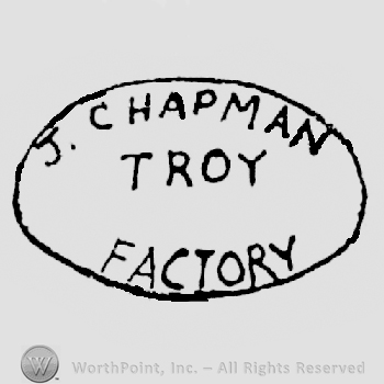 J. Chapman arched written above Troy written above Factory, all in a oval shape frame