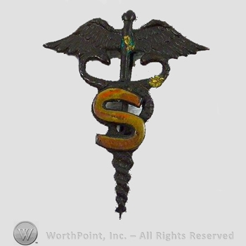 WWI Metal Insignia : Army Sanitary Corps Collar Insignia.