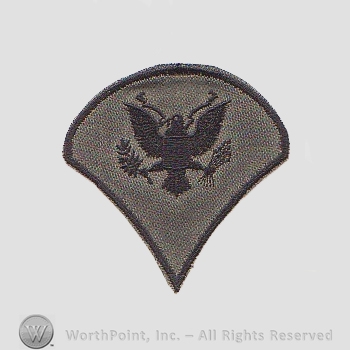 Vietnam Era Subdued Enlisted Ranks Patch : Specialist 4th Class.
