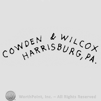 Cowden & Wilcox written arched above Harrisburg, Pa.