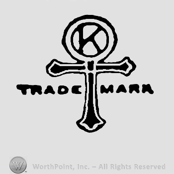 A cross with a circle on the upper part and letter K written inside, Trade Mark written with uppercase letters.