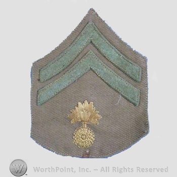 WWI Chevrons : Ordnance Corps Corporal Khaki Chevron.