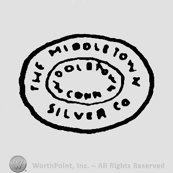 An oval and SILVER PLATE CO. written on.