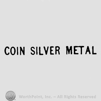 COIN SILVER METAL written with uppercase letters. 