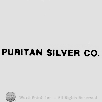 PURITAN SILVER CO. written with uppercase letters.