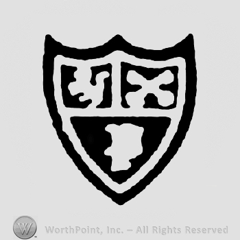 A shield with three images on it.