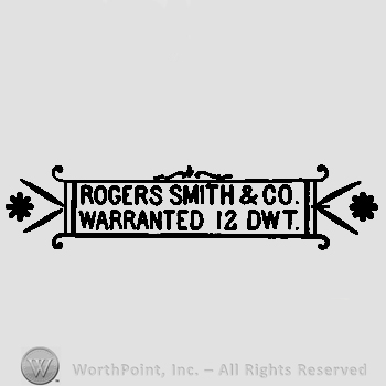 Written ROGERS SMITH&CO WARRANTED 12 DWT and a flower on both sides .