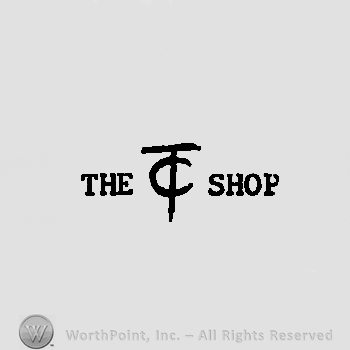 THE T C SHOP written in uppercase letters, letters TC are entwined. 