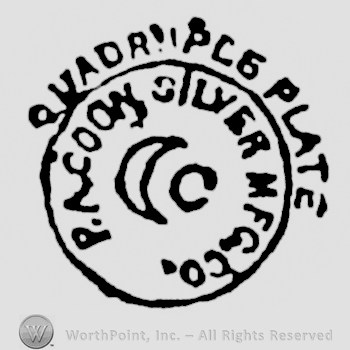 A circle enclosing a crescent and the text P.A. Coon Silver MFG. Co. written in uppercase, Quadruple Plate written outside the circle in uppercase letters. 