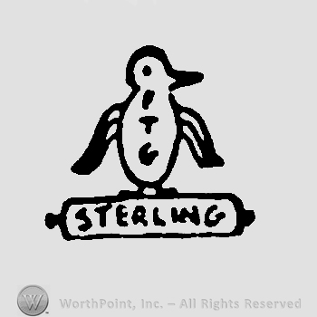 A penguin, ribbon with the word Sterling written below.