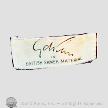 Clothing label : Gilbert Adrian.