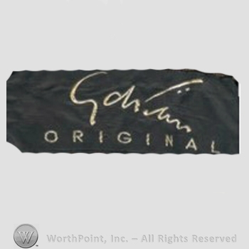 Clothing label : Gilbert Adrian.
