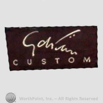 Clothing label : Gilbert Adrian.