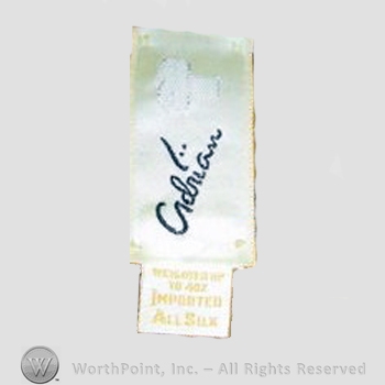 Clothing label : Gilbert Adrian.