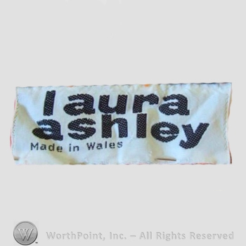 Clothing label : Laura Mountney Ashley.