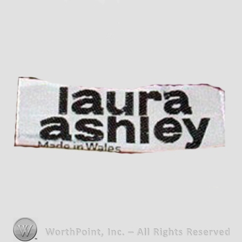 Clothing label : Laura Mountney Ashley.