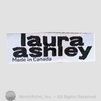 Clothing label : Laura Mountney Ashley.