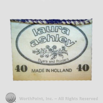 Clothing label : Laura Mountney Ashley.