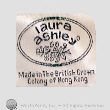 Clothing label : Laura Mountney Ashley.