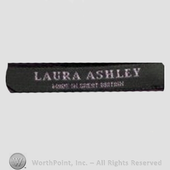 Clothing label : Laura Mountney Ashley.