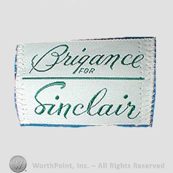 Clothing label : Tom Brigance.