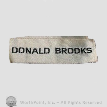 Clothing label : Donald Brooks.