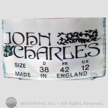 Clothing label : John Charles.