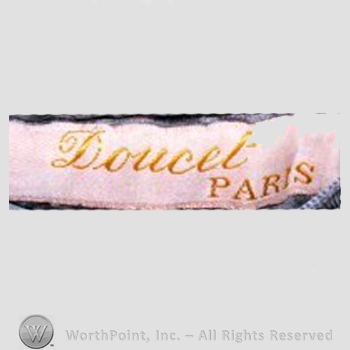 Clothing label : Jacques Doucet .