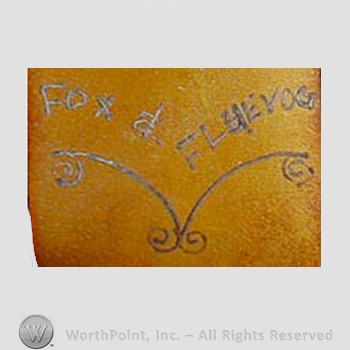 Clothing label : John Fluevog.