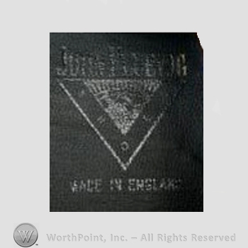 Clothing label : John Fluevog.