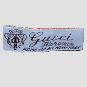 Clothing label : Guccio Gucci.