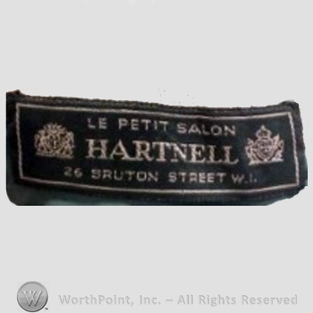 Clothing label : Norman Hartnell.