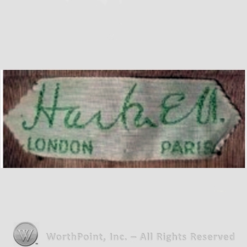 Clothing label : Norman Hartnell.